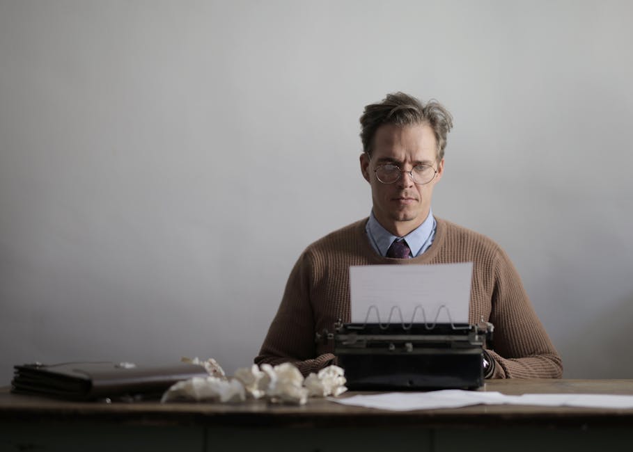 Creative professional using laptop with AI writing platform and document editor