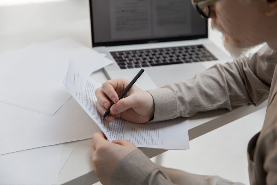 Modern workspace with monitor displaying copywriting software and marketing content
